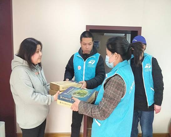 兰州市图书馆开展 学雷锋 献爱心 帮残助残活动